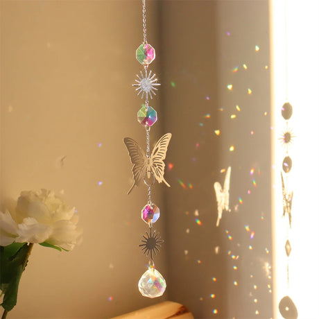 Crystal Prism Sun Catcher Wind Chime hanging crystal piece for light catching, peaceful room decor, and window display.