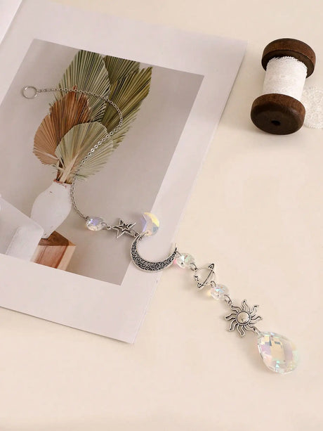 Crystal Star and Moon suncatcher wall hanging for catching sunlight, creating rainbow reflections, and decorating living spaces.