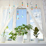 7-Piece Colorful Crystal Sun Catcher Set colorful crystal prisms for window decor, sunlight reflection, and creating rainbow effects indoors.