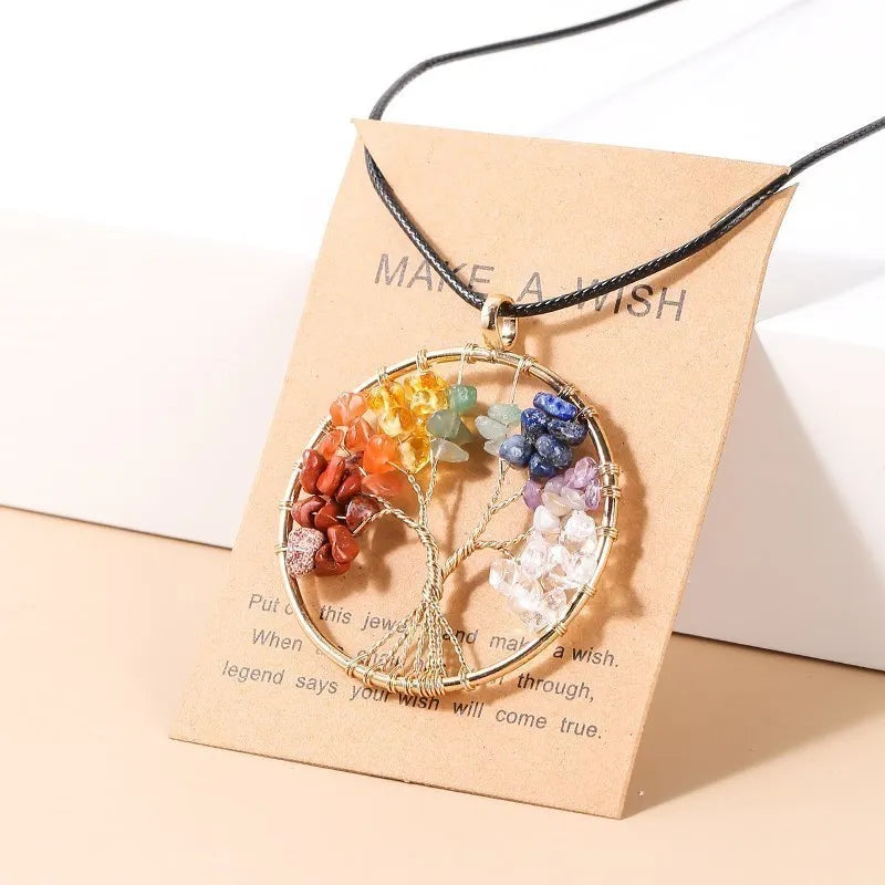 Crystal Tree of Life 7-Chakra pendant necklace for spiritual healing, yoga, and energy-focused use.