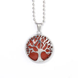 Crystal Tree of Life Red Jasper pendant with chain for gemstone jewelry use, grounding energy, and gift giving.