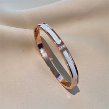 Cubic zirconia Gold Shell open bracelet for adding shimmer to party outfits, dinner wear, and polished daily looks.