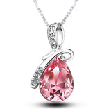 Dainty colorful CZ pendant necklace with teardrop shape for light everyday accessorizing, casual chic outfits, and thoughtful gifting.