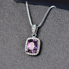 Dainty CZ geometric necklace pendant with delicate chain for minimalist fashion styling, layering, and casual wear.