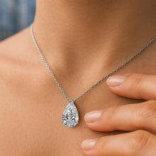 Pear-Cut Moissanite Pendant dainty necklace with a pear-cut gemstone for minimal jewelry styling, office wear, and everyday elegance.