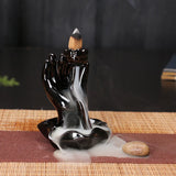 Decorative ceramic aromatherapy burner for burning oils or incense, creating a soothing atmosphere, and room scenting.