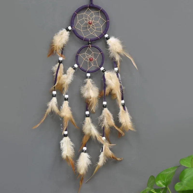 Decorative Indian Dream Catcher brown feather wall art for bedroom wall decor, bohemian interior design, and gift giving.