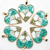 Decorative natural stone Tree of Life pendants for necklace making, charm collections, and handmade accessory use.