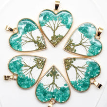 Decorative natural stone Tree of Life pendants for necklace making, charm collections, and handmade accessory use.