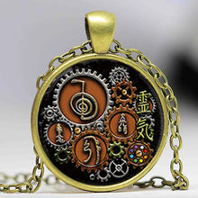 Decorative steampunk Reiki glass necklace pendant for holistic fashion styling, energy-inspired accessorizing, and gift-ready wear.