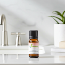 Dell Wood Essential Oil glass bottle for warm woody diffuser blending, aromatherapy practice, and natural home scenting.