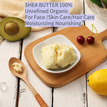 Dimollaure Organic Unrefined Shea Butter Oil in bowl with natural avocado and lemon ingredients on wood surface.