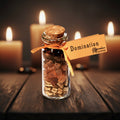 Domination pocket spell bottle with herbs