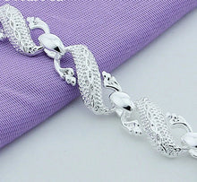 DOTEFFIL Silver Dragon cuff bracelet for fantasy-inspired outfits, statement wear, and personal jewelry styling.