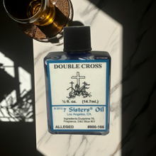 Double Cross Wish Oil anointing oil bottle for candle dressing, wish rituals, and altar work.