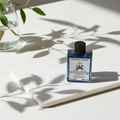 Double Cross Wish Oil bottle for wish work, intention setting, and spiritual ritual use.