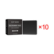 East Moon Niacinamide Whitening Acne-Fading Soap black bar and packaging with East Moon branding.