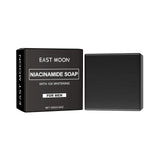 East Moon Niacinamide Whitening Acne-Fading Soap bar display with packaging on white background.