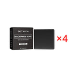 East Moon Niacinamide Whitening Acne-Fading Soap black bar with packaging on white background side.