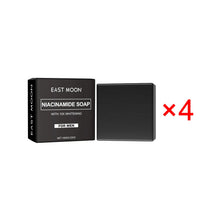 East Moon Niacinamide Whitening Acne-Fading Soap black bar with packaging on white background side.