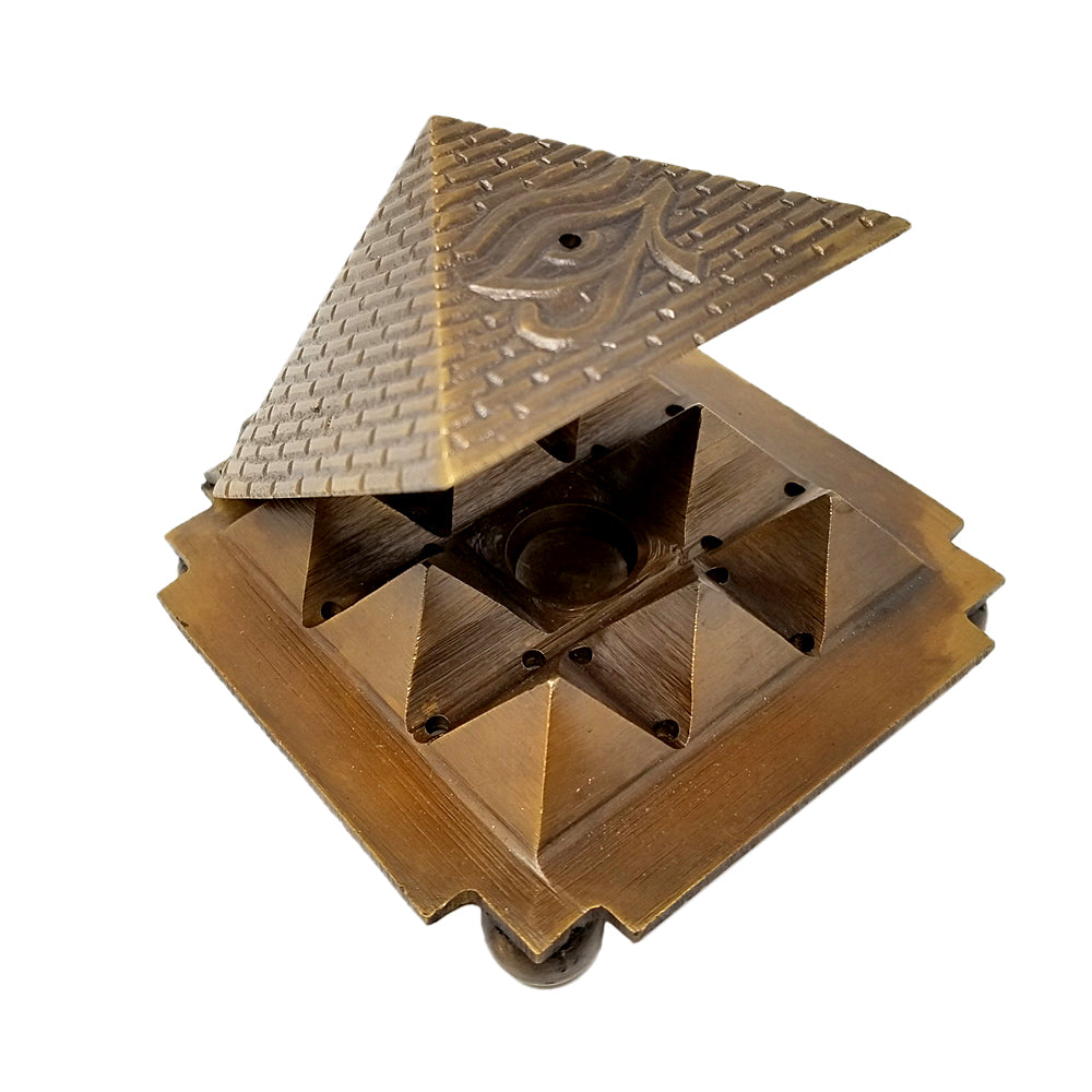 Egyptian brass cone burner with 9 pyramid design for cone incense use in prayer spaces, spiritual cleansing, and decorative fragrance rituals.