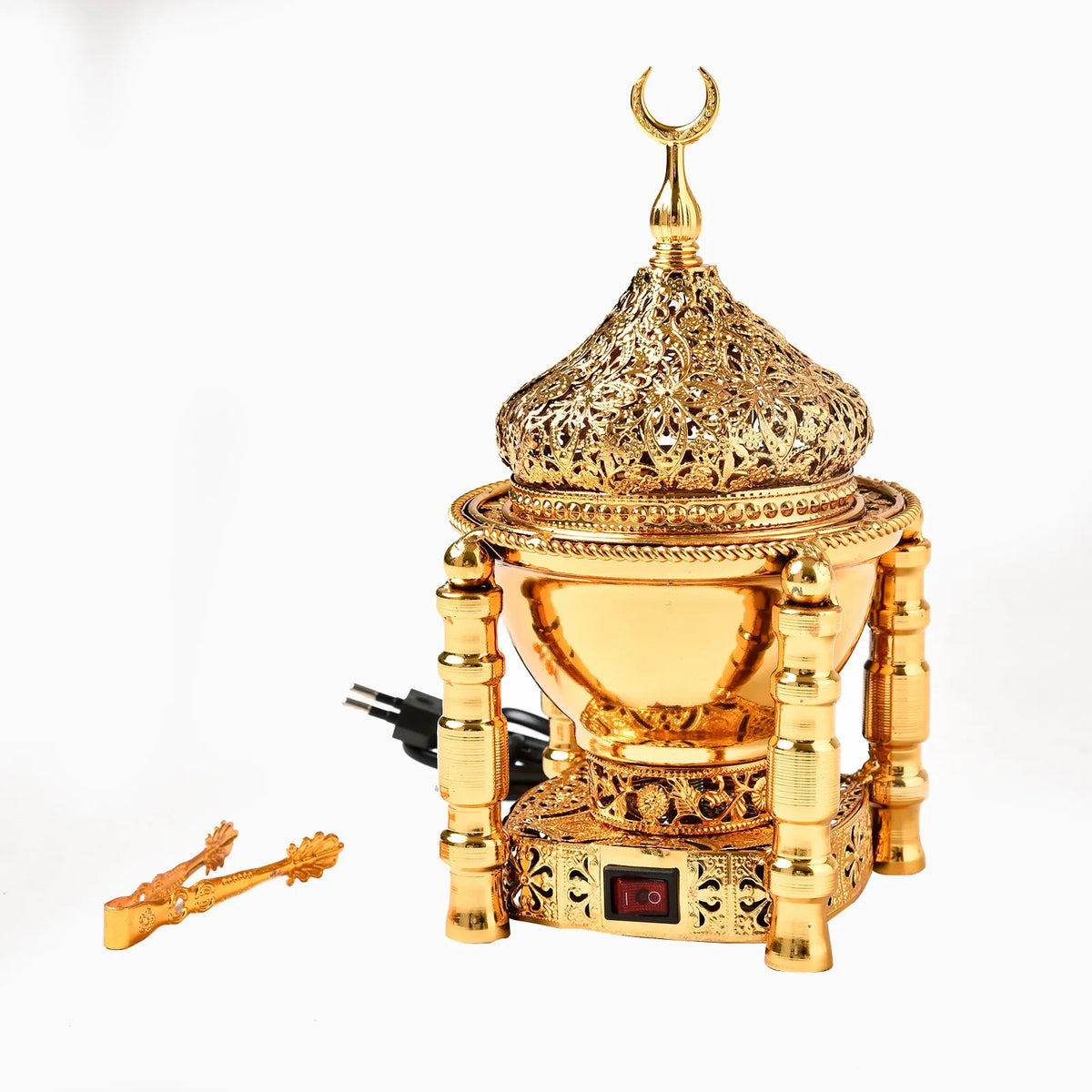 Electric metal bakhoor incense burner for burning bakhoor and oud chips for aromatic room scenting.