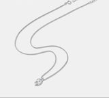 Elegant 1ct marquise moissanite pendant necklace for office wear, layered jewelry looks, and timeless accessorizing.