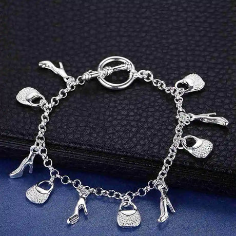 Elegant 925 Sterling Silver Heart Link Bracelet silver bracelet for formal events, fashionable daily wear, and gift giving.