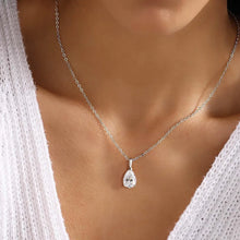 Elegant pear-cut moissanite silver pendant for dressy events, romantic gifts, and sophisticated accessorizing.