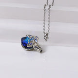 Elegant sapphire teardrop necklace in sterling silver for polished office style, celebrations, and necklace layering.