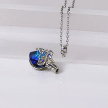 Elegant sapphire teardrop necklace in sterling silver for polished office style, celebrations, and necklace layering.