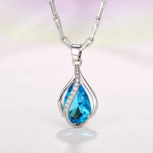 Elegant Sky Blue cubic zirconia necklace with teardrop charm for weddings, parties, and sophisticated styling.