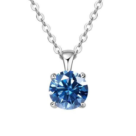 Elegant solitaire moissanite pendant necklace with four-prong mount for evening looks, fine jewelry wear, and celebrations.