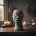 Elegua head statue, 7 inches, cowrie shell detailing