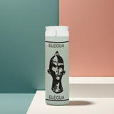 Elegua white glass jar candle for altar setup, devotional practice, and ritual candle burning.