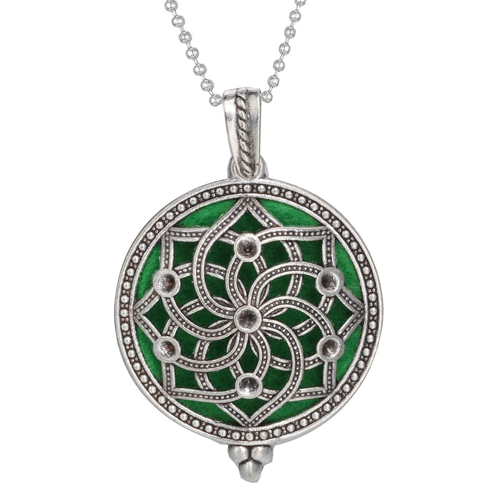 Engraved Tree of Life diffuser necklace pendant for essential oil diffusion, mindfulness, and all-day personal wellness wear.
