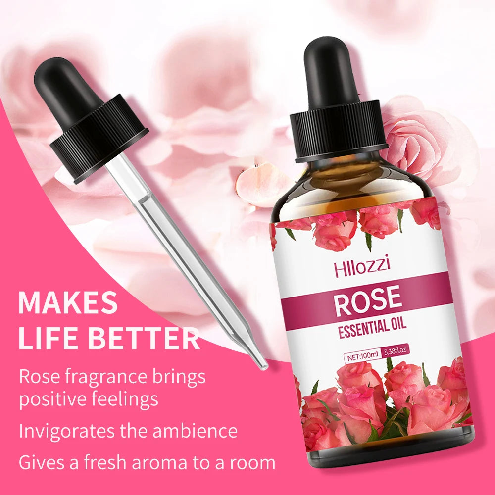 Rose essential oil bottle with dropper on a pink background with roses.