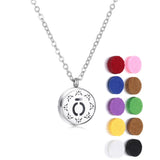Mini Tree Flower Aromatherapy Locket pendant for diffusing essential oils during meditation, prayer, and wellness practice.