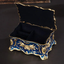European-inspired metal jewelry box keepsake holder for storing small jewelry pieces and sentimental items.