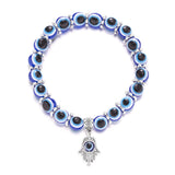 Evil eye beaded bracelet with charms for everyday jewelry styling, symbolic warding use, and fashion accessorizing.