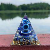 Evil Eye Lapis Lazuli Healing Crystal Pyramid for meditation, energy healing, and home décor.
