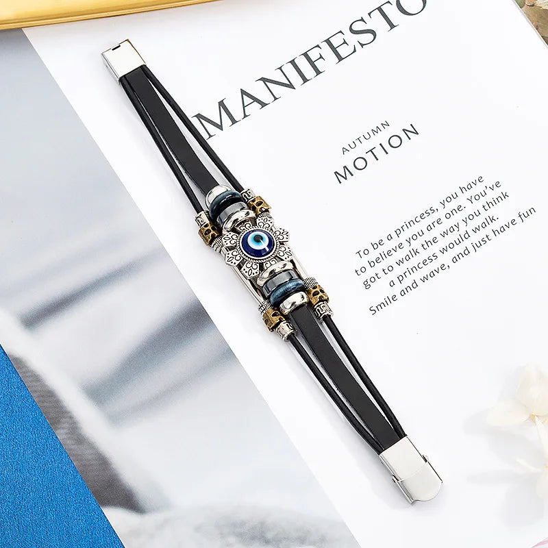 Evil Eye leather bracelet for men with black band design for casual wear, symbolic protection, and everyday accessory use.