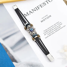 Evil Eye leather bracelet for men with black band design for casual wear, symbolic protection, and everyday accessory use.