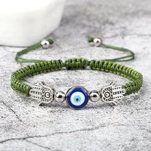 Hand of Fatima Evil Eye red rope bracelet for evil eye protection, casual wear, and spiritual charm use.