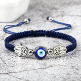 Hand of Fatima Evil Eye red rope bracelet for protective symbolism, everyday fashion, and spiritual accessory wear.
