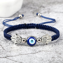 Hand of Fatima Evil Eye red rope bracelet for protective symbolism, everyday fashion, and spiritual accessory wear.
