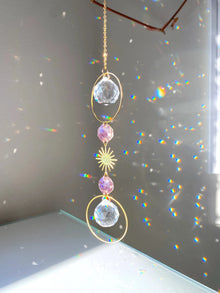 Crystal Sun Catcher Prism Rainbow Maker faceted crystal hanger for window decor and natural rainbow-making effect.