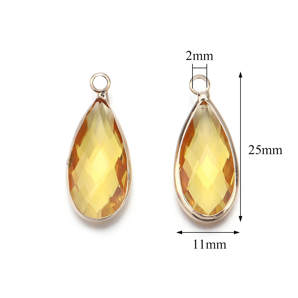 Faceted teardrop crystal glass charms for earrings, pendants, and handmade jewelry creation.