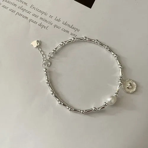 Silver Dreamcatcher Charm fashion bangle bracelet for everyday use, trendy wrist styling, and boho-inspired outfits.