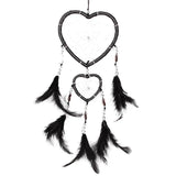 Pink and purple feather dreamcatcher decor for bedroom walls, nursery decoration, and cozy living space styling.